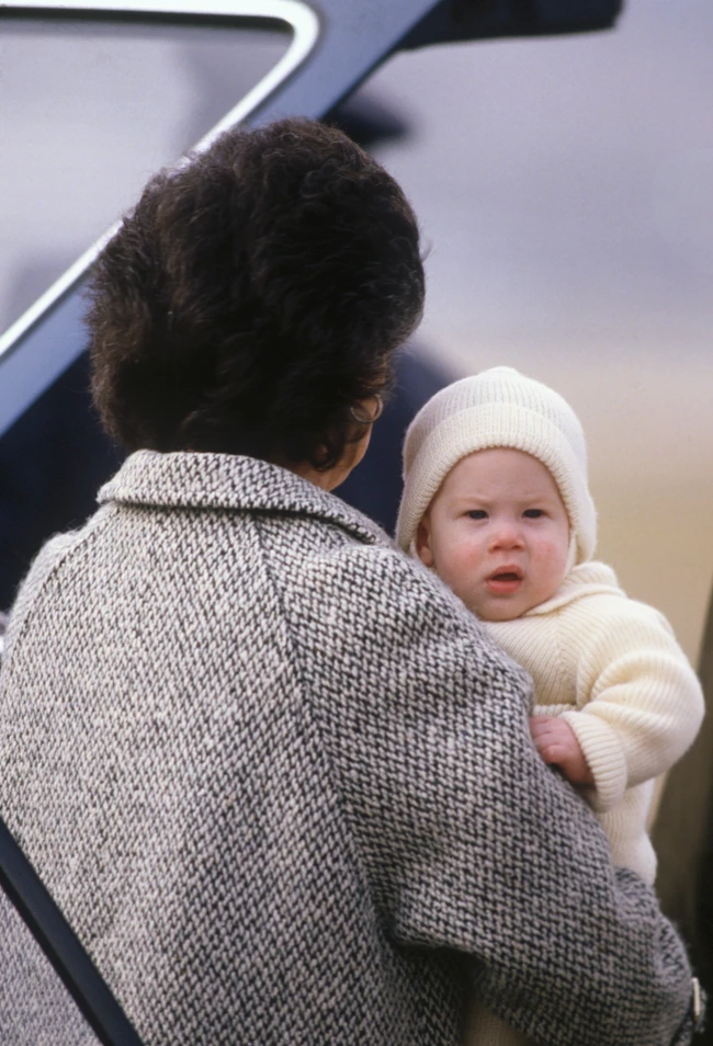 celebrities_ prince-harry-is-carried-by-his-nanny-barbara-barnes