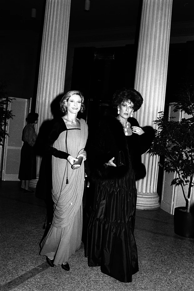 Nan Kempner in YSL and Pat Buckley in Oscar de la Renta